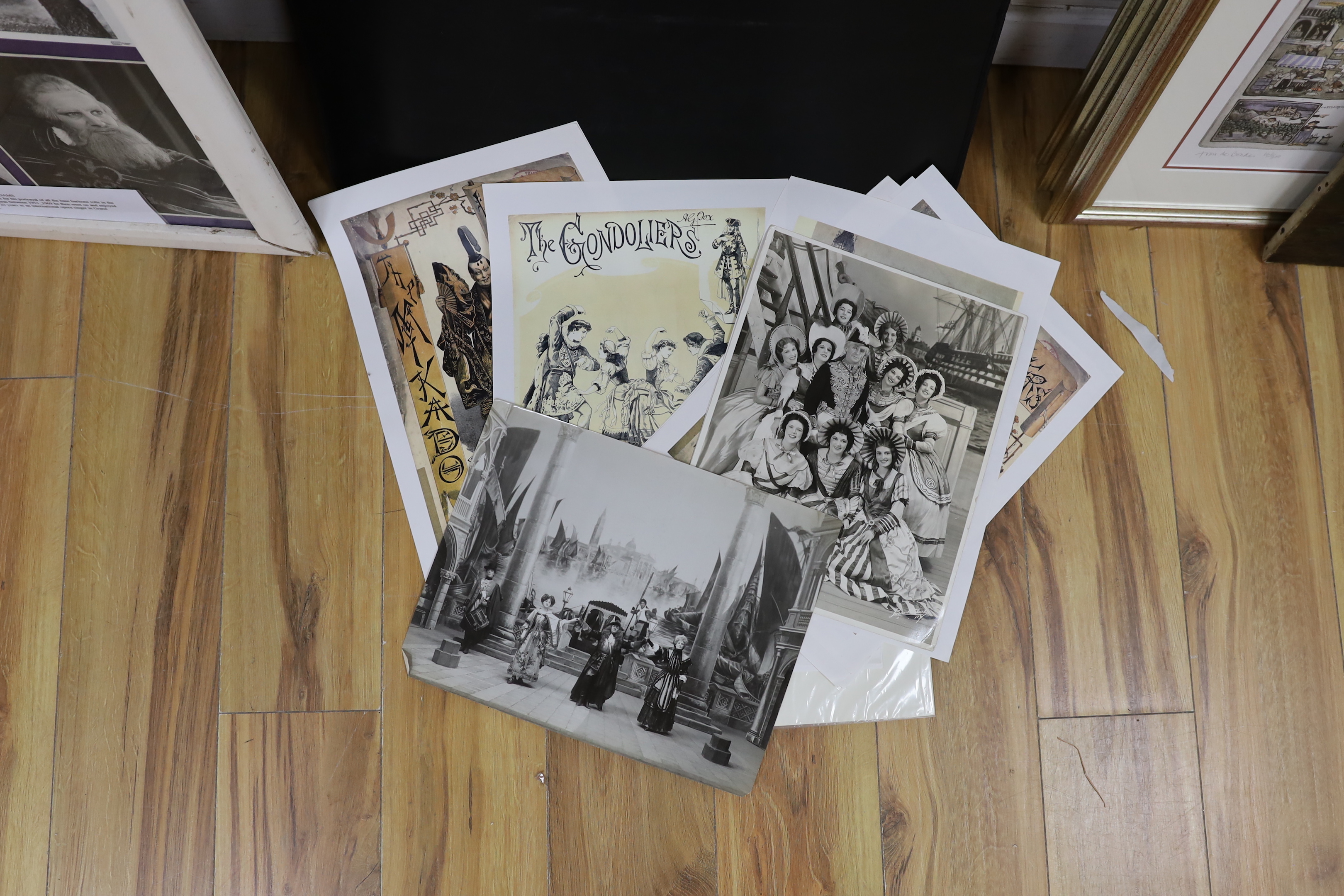 An early 20th century lithograph poster for Gilbert & Sullivan’s H.M.S. Pinafore, in an oak frame, together with a framed play bill, another framed poster, a large framed production photograph and a framed photo montage